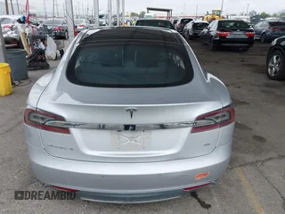 2014 Tesla Model S 60 with VIN 5YJSA1H12EFP32213, listed as a IAAI auction lot 42194085 with 56,071 mi miles and . Bid and sale history available at DreamBid. Image 17.