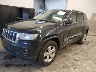 2012 Jeep Grand Cherokee Laredo with VIN 1C4RJFAG5CC351539, listed as a IAAI auction lot 41861533 with 166,909 mi miles. Bid and sale history available at carsss.com. Image 18.