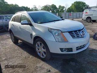2014 Cadillac SRX Performance Collection with VIN 3GYFNCE36ES662689, listed as a IAAI auction lot 42109417 with 132,957 mi miles. Bid and sale history available at carsss.com. Image 1.