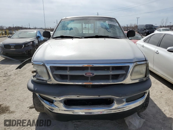 1998 Ford F-150 z VIN 1FTZF18W9WKA65043, wystawiony jako Copart lot #48902695 z przebiegiem 133 727 mil mil oraz Szkoda całkowita • Salvage title. Historia ofert i sprzedaży dostępna na DreamBid. Obrazek 5.