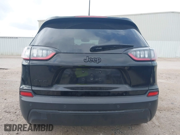 2023 Jeep Cherokee Altitude Lux with VIN 1C4PJMMB9PD114936, listed as a IAAI auction lot 42159214 with 59,525 mi miles. Bid and sale history available at carsss.com. Image 17.