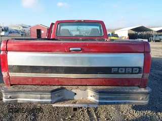 1996 Ford F-150 with VIN 1FTEF14H7TLB56002, listed as a IAAI auction lot 41403997 with 216,886 mi miles. Bid and sale history available at carsss.com. Image 8.