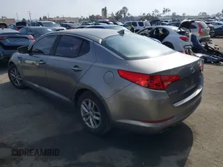 2012 Kia Optima LX with VIN 5XXGM4A71CG082202, listed as a IAAI auction lot 42046876 with Not Provided miles and . Bid and sale history available at carsss.com. Image 3.
