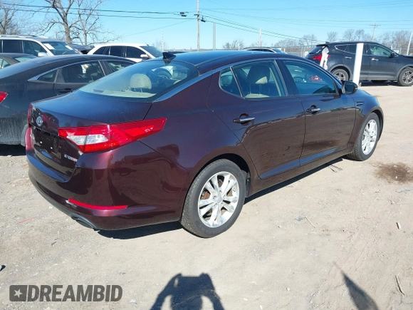 2012 Kia Optima EX with VIN 5XXGN4A6XCG041961, listed as a IAAI auction lot 41705409 with 171,216 mi miles and . Bid and sale history available at carsss.com. Image 4.