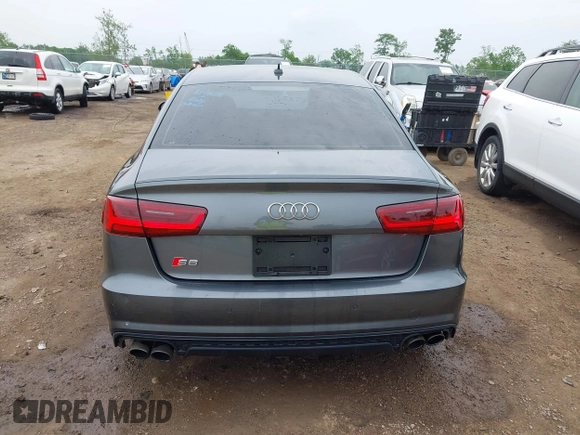2016 Audi S6 Prestige z VIN WAUH2AFC1GN016187, wystawiony jako IAAI lot #42274744 z przebiegiem 169 821 mil mil oraz . Historia ofert i sprzedaży dostępna na DreamBid. Obrazek 16.
