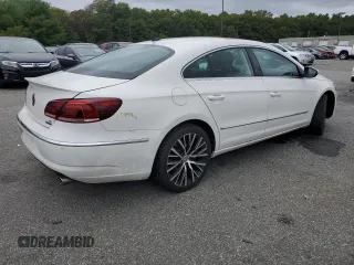 2014 Volkswagen CC VR6 Executive 4Motion with VIN WVWGU7AN2EE523987, listed as a Copart auction lot 71685214 with 77,732 mi miles and Salvage Title. Bid and sale history available at carsss.com. Image 3.