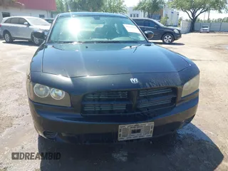 2008 Dodge Charger with VIN 2B3KA43R58H144448, listed as a IAAI auction lot 42015594 with 199,886 mi miles and . Bid and sale history available at carsss.com. Image 6.