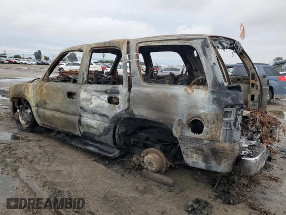 2003 Chevrolet Tahoe LS z VIN 1GNEC13T23J285248, wystawiony jako Copart lot #82634824 z przebiegiem Nie podano mil oraz Nie do naprawy • Non repairable. Historia ofert i sprzedaży dostępna na DreamBid. Obrazek 2.