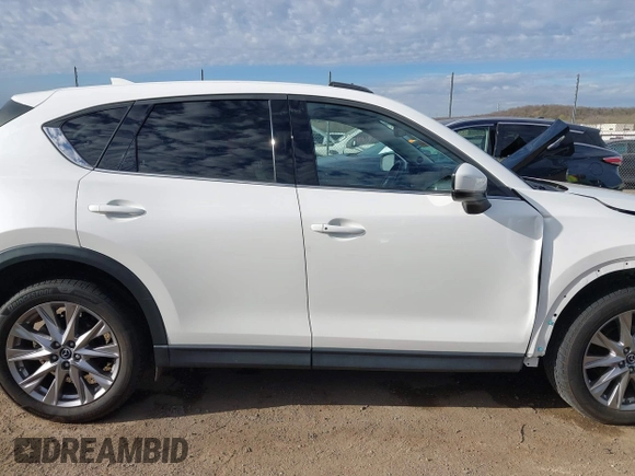 2019 Mazda CX-5 Grand Touring with VIN JM3KFBDM8K0518576, listed as a IAAI auction lot 41854296 with 88,706 mi miles and . Bid and sale history available at carsss.com. Image 13.