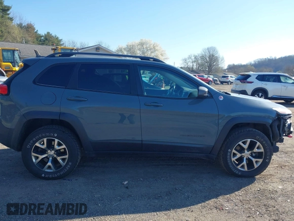 2014 Jeep Cherokee Trailhawk with VIN 1C4PJMBS4EW179763, listed as a IAAI auction lot 41988048 with 152,681 mi miles. Bid and sale history available at carsss.com. Image 14.