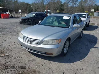 2008 Hyundai Azera Limited with VIN KMHFC46F68A256391, listed as a IAAI auction lot 41669788 with 203,636 mi miles and . Bid and sale history available at carsss.com. Image 2.