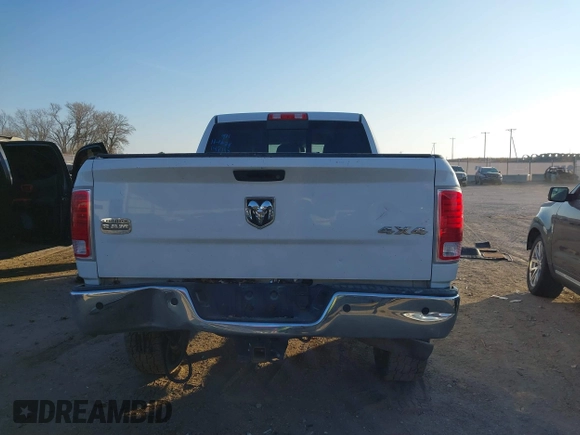 2014 Ram 2500 Longhorn with VIN 3C6UR5PL7EG191298, listed as a IAAI auction lot 40978191 with 156,686 mi miles. Bid and sale history available at carsss.com. Image 16.