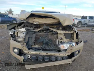 2016 Toyota Tacoma SR with VIN 5TFRX5GN8GX057937, listed as a IAAI auction lot 40760420 with 113,698 mi miles and . Bid and sale history available at DreamBid. Image 12.