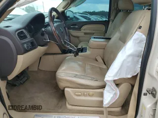 2011 GMC Yukon Denali with VIN 1GKS1EEFXBR313625, listed as a Copart auction lot 72634294 with 129,834 mi miles and Salvage Title. Bid and sale history available at carsss.com. Image 7.