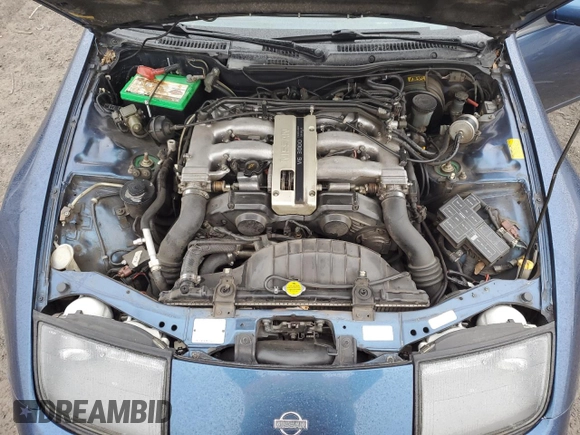 1992 Nissan 300ZX z VIN JN1RZ26H9NX522195, wystawiony jako Copart lot #88170195 z przebiegiem 104 669 mil mil oraz Szkoda całkowita • Salvage title. Historia ofert i sprzedaży dostępna na DreamBid. Obrazek 11.