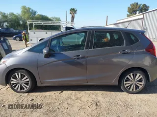 2015 Honda Fit EX-L with VIN 3HGGK5H88FM772964, listed as a IAAI auction lot 42020142 with 154,799 mi miles. Bid and sale history available at carsss.com. Image 14.