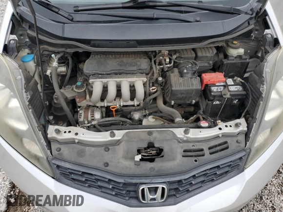 2012 Honda Fit Sport с VIN JHMGE8H56CC020916, выставлен на аукционе Copart как лот 57624975 с пробегом 133 827 миль миль и Списание • Salvage title. История ставок и продаж доступна на DreamBid. Изображение 11.