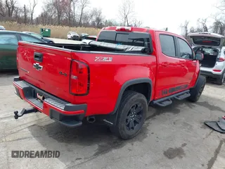 2018 Chevrolet Colorado 4WD Z71 z VIN 1GCGTDEN8J1141945, wystawiony jako IAAI lot #41837680 z przebiegiem 67 686 mil mil oraz . Historia ofert i sprzedaży dostępna na DreamBid. Obrazek 4.