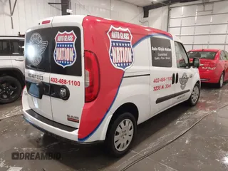 2017 Ram ProMaster City Cargo Van Tradesman SLT with VIN ZFBERFBB9H6E69115, listed as a IAAI auction lot 41798498 with 131,463 mi miles. Bid and sale history available at carsss.com. Image 4.