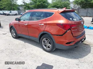 2017 Hyundai Santa Fe 2.4L z VIN 5XYZUDLB1HG463416, wystawiony jako IAAI lot #42546637 z przebiegiem 81 963 mil mil oraz . Historia ofert i sprzedaży dostępna na DreamBid. Obrazek 3.