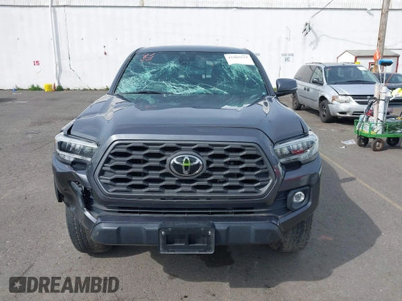 2020 Toyota Tacoma SR5 with VIN 3TMCZ5AN7LM321061, listed as a IAAI auction lot 41985533 with 32,111 mi miles and . Bid and sale history available at DreamBid. Image 13.