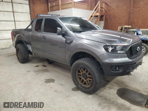 2021 Ford Ranger XL with VIN 1FTER1FH3MLD22019, listed as a Copart auction lot 60024705 with 64,791 mi miles and Salvage title. Bid and sale history available at DreamBid. Image 4.