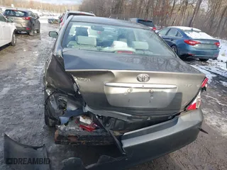 2003 Toyota Camry LE with VIN 4T1BE30K53U649007, listed as a IAAI auction lot 41030219 with 208,469 mi miles. Bid and sale history available at carsss.com. Image 16.