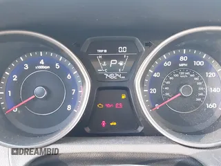 2015 Hyundai Elantra SE z VIN 5NPDH4AE9FH562261, wystawiony jako IAAI lot #41710313 z przebiegiem 74 824 mil mil oraz . Historia ofert i sprzedaży dostępna na DreamBid. Obrazek 7.
