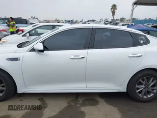2019 Kia Optima LX with VIN 5XXGT4L36KG371801, listed as a IAAI auction lot 41885607 with 150,043 mi miles. Bid and sale history available at carsss.com. Image 14.