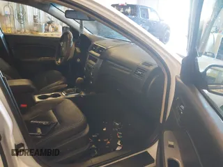 2012 Ford Fusion SEL with VIN 3FAHP0JGXCR128976, listed as a IAAI auction lot 41721468 with 115,277 mi miles. Bid and sale history available at carsss.com. Image 5.