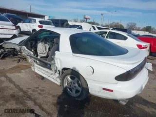 1999 Pontiac Firebird with VIN 2G2FS22K6X2207200, listed as a IAAI auction lot 41346548 with 1 mi miles. Bid and sale history available at carsss.com. Image 3.