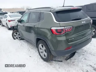 2018 Jeep Compass Altitude with VIN 3C4NJDBB1JT479462, listed as a IAAI auction lot 41276119 with 58,895 mi miles and . Bid and sale history available at carsss.com. Image 3.