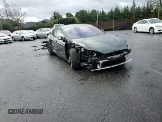 2024 Tesla Model S with VIN 5YJSA1E54RF536092, listed as a Copart auction lot 85934334 with 11,451 mi miles and Salvage title. Bid and sale history available at DreamBid. Image 10.