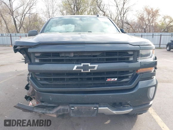2017 Chevrolet Silverado 1500 LT with VIN 3GCUKREC7HG220780, listed as a IAAI auction lot 41978463 with 131,532 mi miles and . Bid and sale history available at DreamBid. Image 12.