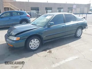 1996 Honda Accord LX with VIN 1HGCD5636TA182464, listed as a IAAI auction lot 41867521 with 191,832 mi miles and . Bid and sale history available at carsss.com. Image 21.