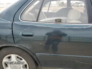 1994 Toyota Camry LE z VIN JT2GK12E2R0039606, wystawiony jako Copart lot #49840015 z przebiegiem 197 834 mil mil oraz Szkoda całkowita • Salvage title. Historia ofert i sprzedaży dostępna na DreamBid. Obrazek 10.