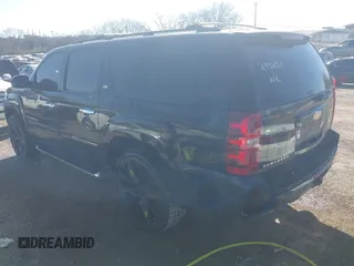 2011 Chevrolet Suburban LT with VIN 1GNSCJE06BR293634, listed as a IAAI auction lot 41742616 with 204,222 mi miles. Bid and sale history available at carsss.com. Image 3.
