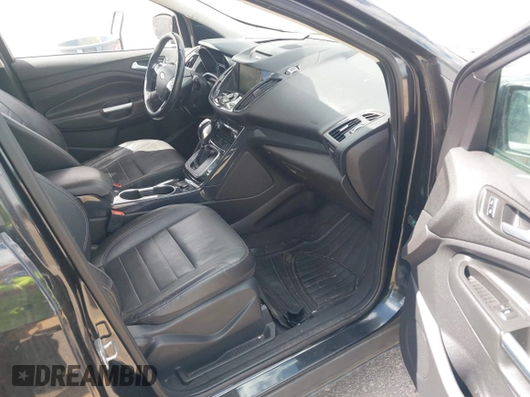 2014 Ford Escape Titanium with VIN 1FMCU9JX2EUB66579, listed as a IAAI auction lot 42171374 with 131,485 mi miles. Bid and sale history available at carsss.com. Image 5.