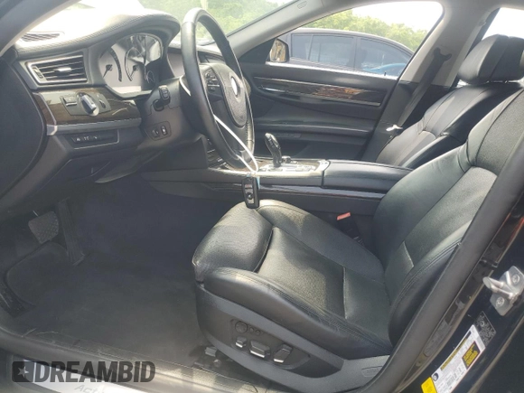 2012 BMW 7 Series with VIN WBAKX6C52CC197154, listed as a Copart auction lot 59897855 with 114,279 mi miles and Clean title. Bid and sale history available at DreamBid. Image 7.