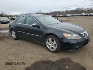 2006 Acura RL with VIN JH4KB16576C003138, listed as a Copart auction lot 52933995 with 176,906 mi miles and Salvage Title. Bid and sale history available at DreamBid. Image 4.