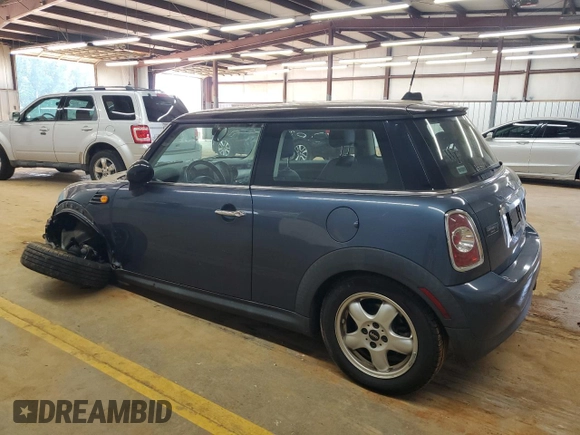 2011 MINI Hardtop with VIN WMWSU3C54BT184251, listed as a Copart auction lot 59298135 with 123,864 mi miles and Salvage title. Bid and sale history available at DreamBid. Image 2.