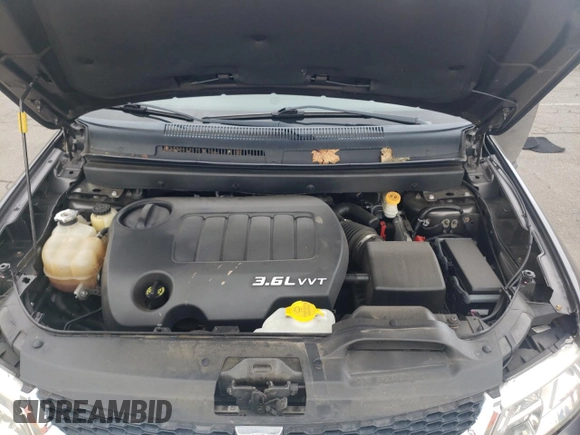 2015 Dodge Journey SXT with VIN 3C4PDDBG1FT725882, listed as a Copart auction lot 55903755 with 111,941 mi miles and Salvage title. Bid and sale history available at DreamBid. Image 12.
