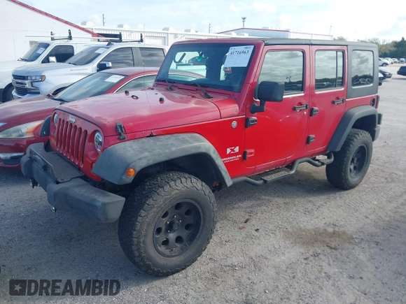 2007 Jeep Wrangler Unlimited X with VIN 1J4GA39197L171132, listed as a IAAI auction lot 41716963 with 145,442 mi miles and . Bid and sale history available at DreamBid. Image 2.