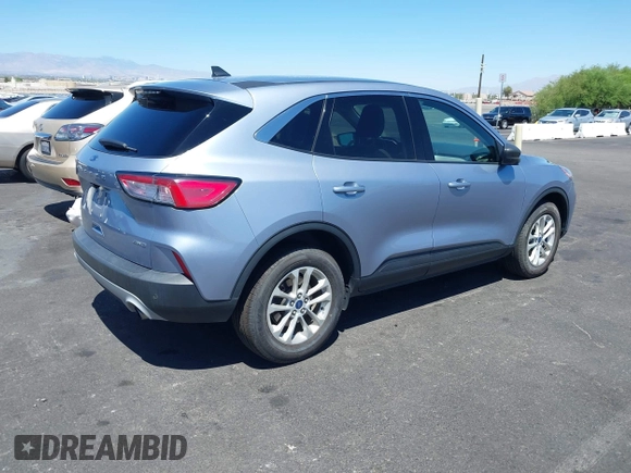 2022 Ford Escape SE with VIN 1FMCU9G66NUA65592, listed as a IAAI auction lot 42810329 with 77,152 mi miles and . Bid and sale history available at DreamBid. Image 4.