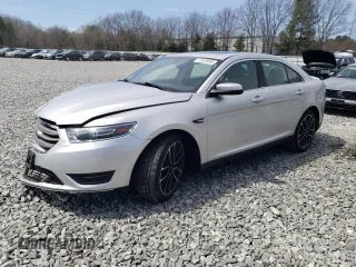 2018 Ford Taurus SEL with VIN 1FAHP2E87JG137928, listed as a Copart auction lot 53438695 with 56,874 mi miles and Salvage title. Bid and sale history available at DreamBid. Image 1.