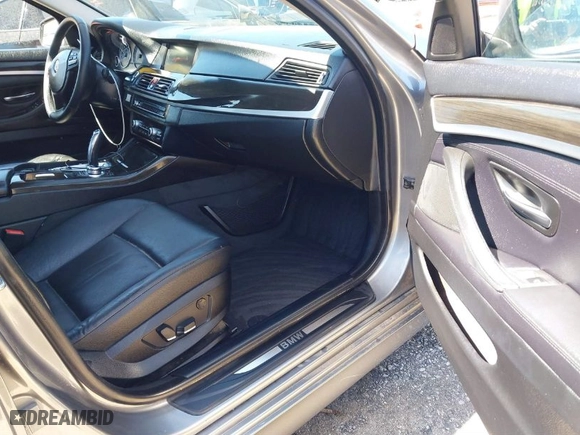 2012 BMW 5 Series 528i with VIN WBAXG5C53CDX03133, listed as a IAAI auction lot 41643009 with 105,360 mi miles. Bid and sale history available at carsss.com. Image 5.