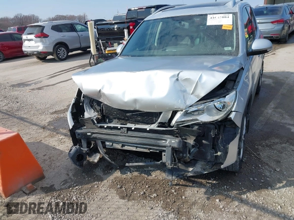 2011 Volkswagen Tiguan SE with VIN WVGBV7AX2BW562055, listed as a IAAI auction lot 41642084 with 175,407 mi miles and . Bid and sale history available at DreamBid. Image 12.