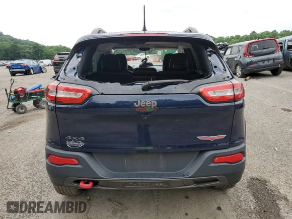2015 Jeep Cherokee Trailhawk with VIN 1C4PJMBB8FW740452, listed as a Copart auction lot 63023715 with 96,236 mi miles and Salvage title. Bid and sale history available at DreamBid. Image 6.