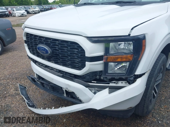 2023 Ford F-150 XL with VIN 1FTEW1CP0PKD52884, listed as a IAAI auction lot 41780292 with 60,103 mi miles and . Bid and sale history available at DreamBid. Image 6.
