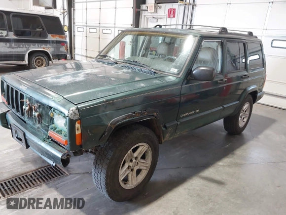 2001 Jeep Cherokee Sport with VIN 1J4FF58S51L579766, listed as a IAAI auction lot 42623211 with 257,681 mi miles and . Bid and sale history available at DreamBid. Image 2.